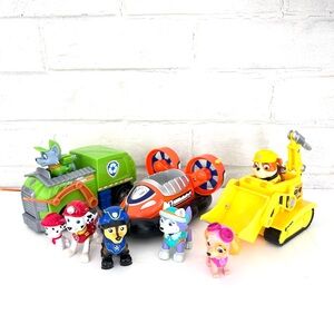 Paw Patrol Action Figure Lot of Three Vehicles and 7 Figures